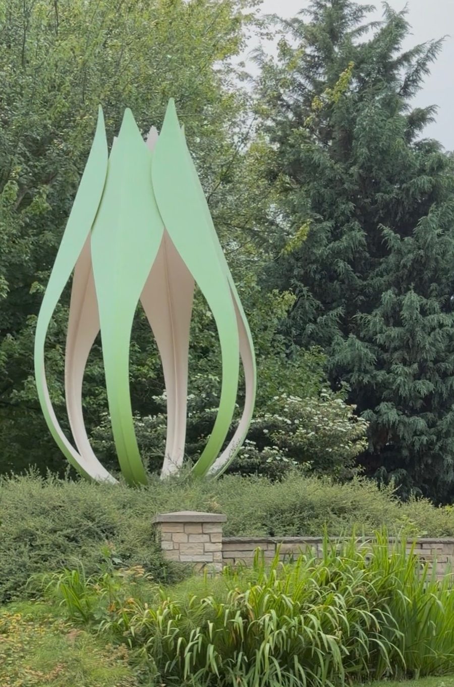 A large tulip sculpture surrounded by greenery in Tigard, Oregon